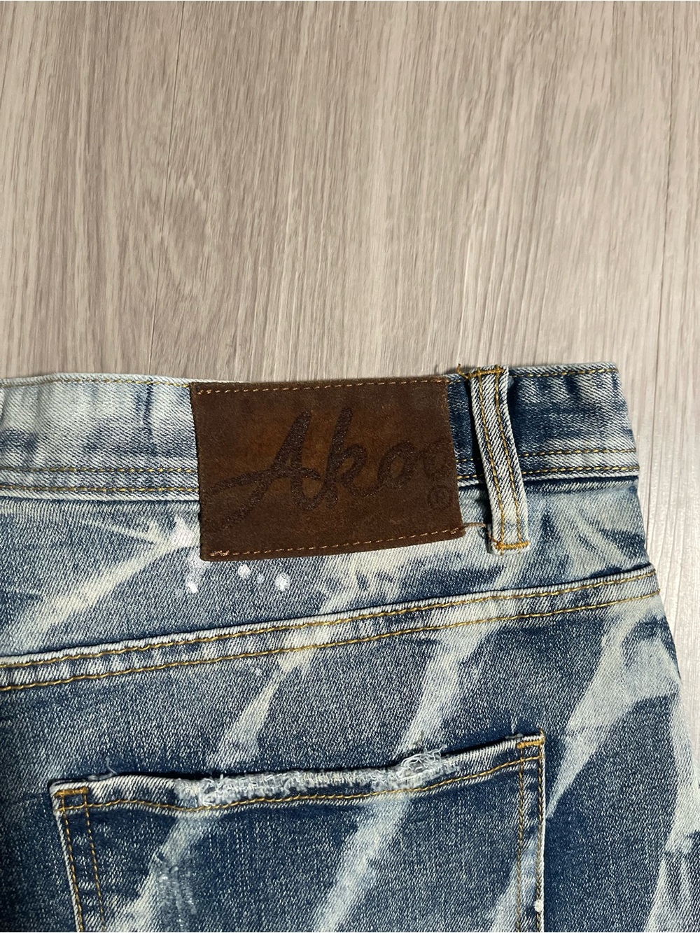 AKOO Men's Distressed Denim Shorts in Washed Blue with Paint Splatter - Picture 5 of 5
